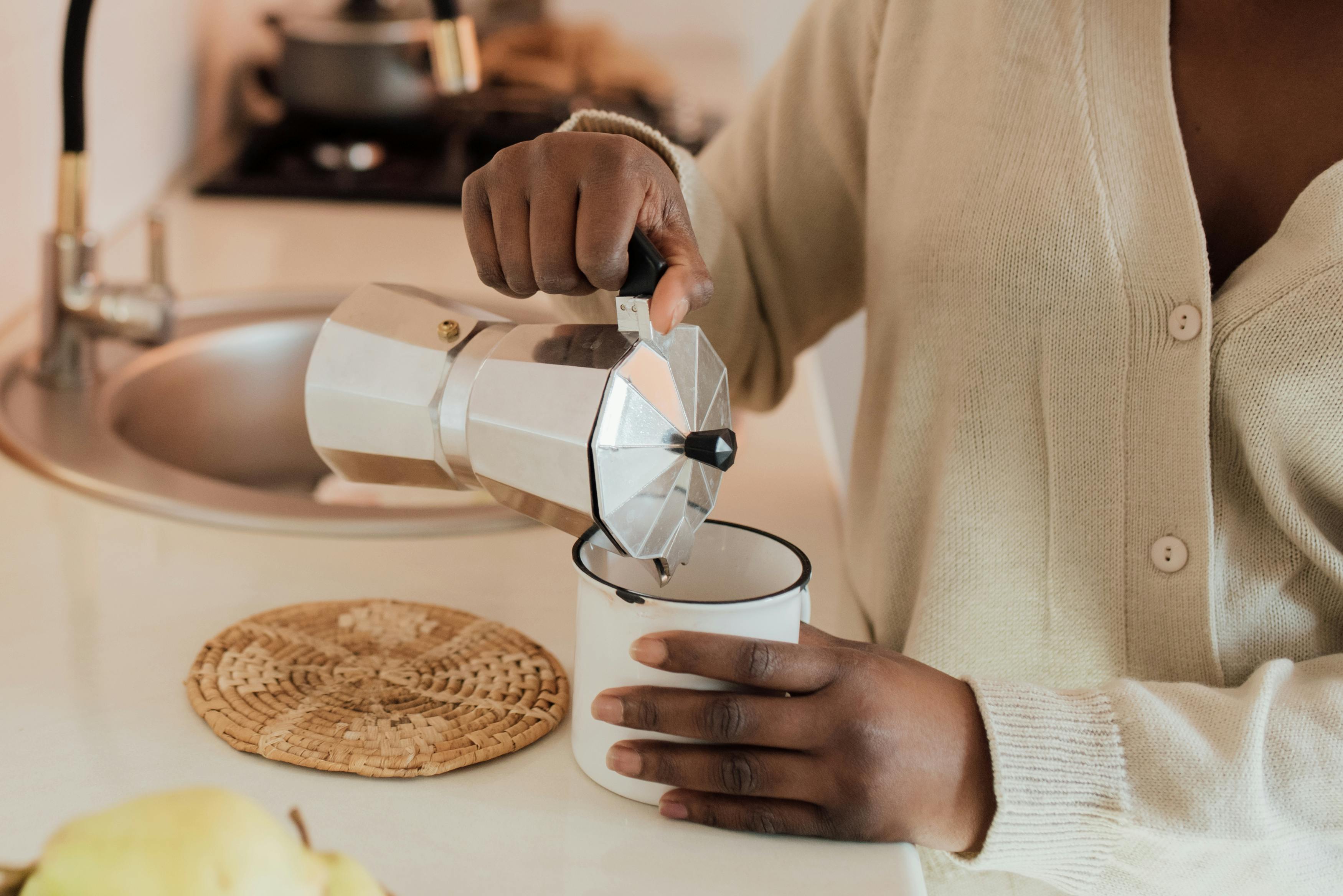 Barista preparing a hazelnut latte in a Calgary café